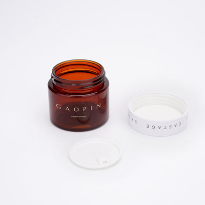 こはく色の化粧品のプラスチックびんは非有毒な無臭を包むSkincareをかわいがる