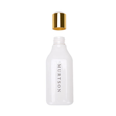 200ml 300mlの毛のシャンプーのびん、白いディスク上の帽子のびん